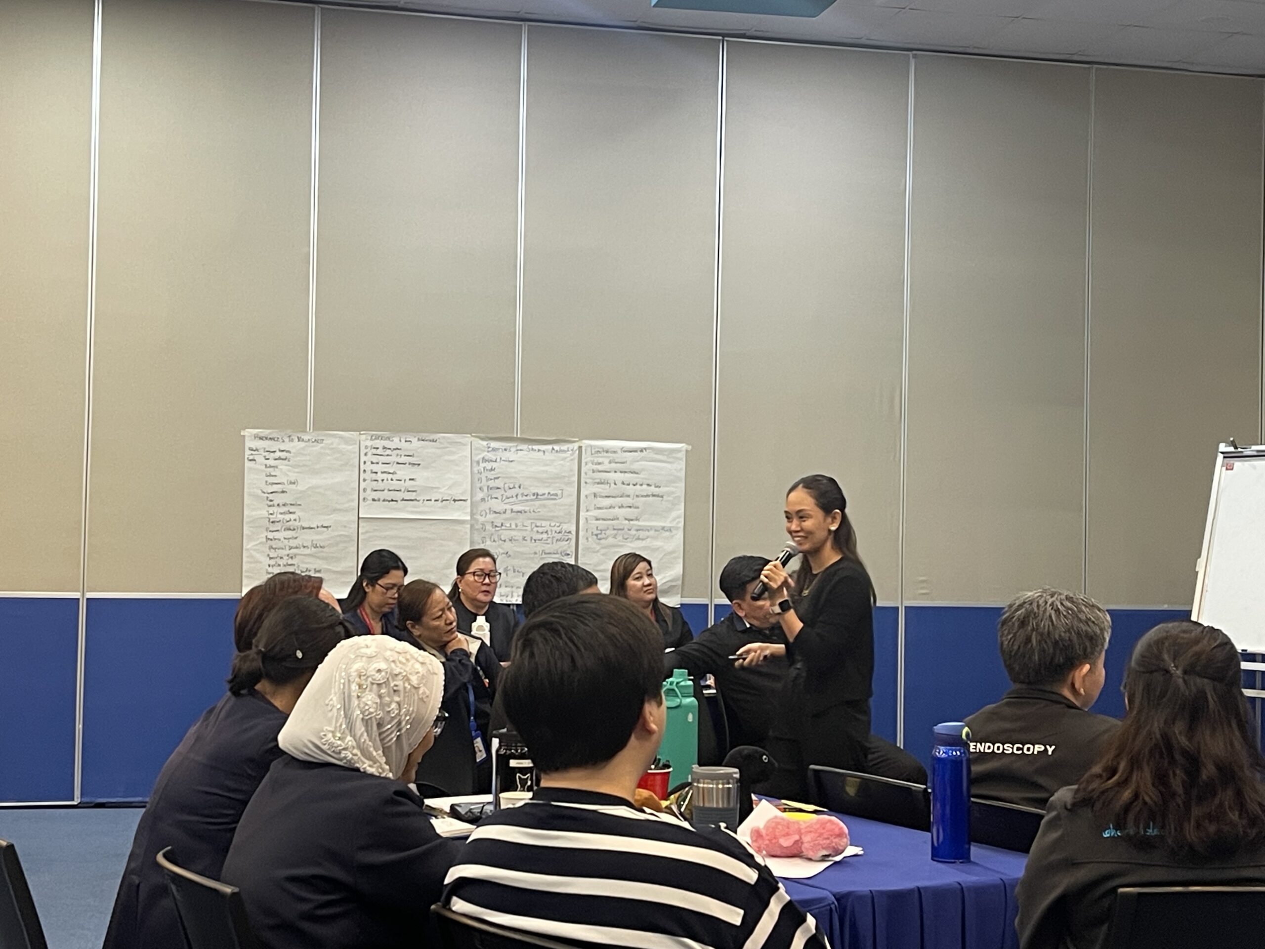 Local leaders and TrainStation International representatives collaborating on future community-building programs.