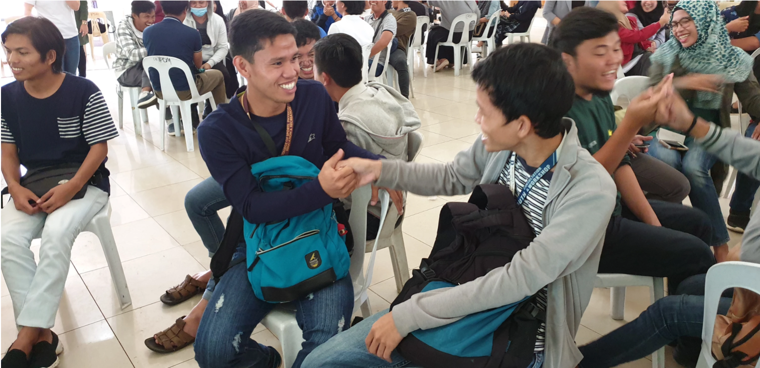 Residents in Marawi engaging in expressive play and psychological first aid activities.