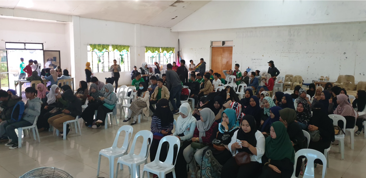 A community circle in Marawi where participants share healing experiences guided by TrainStation coaches.