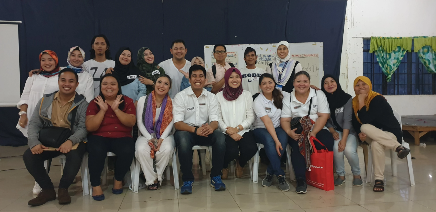 Local Marawi residents collaborating during an economic empowerment and resilience workshop.
