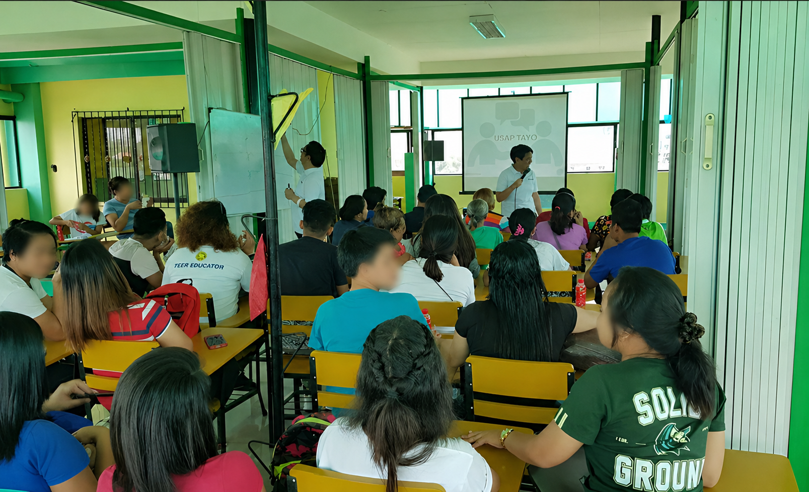 Participants in a 'Usap Tayo' session practicing active listening and empathetic dialogue skills.